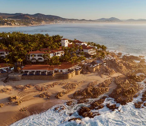 Stunning aerial view of Palmilla resort coastline with luxury buildings